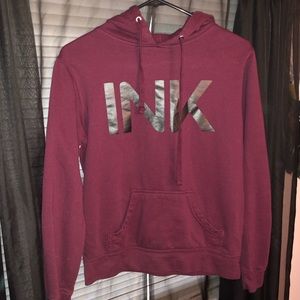 Maroon hoodie.